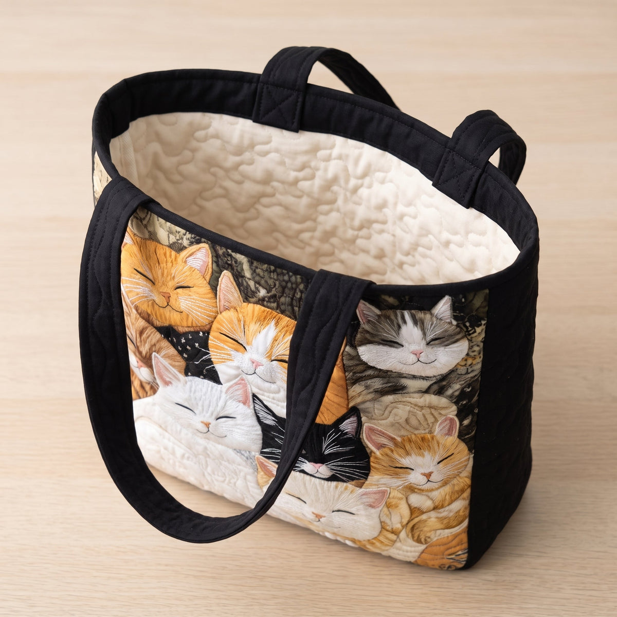 Artisanal Quilted Bag - Sleeping Kittens — open, showing the plain cream quilted lining