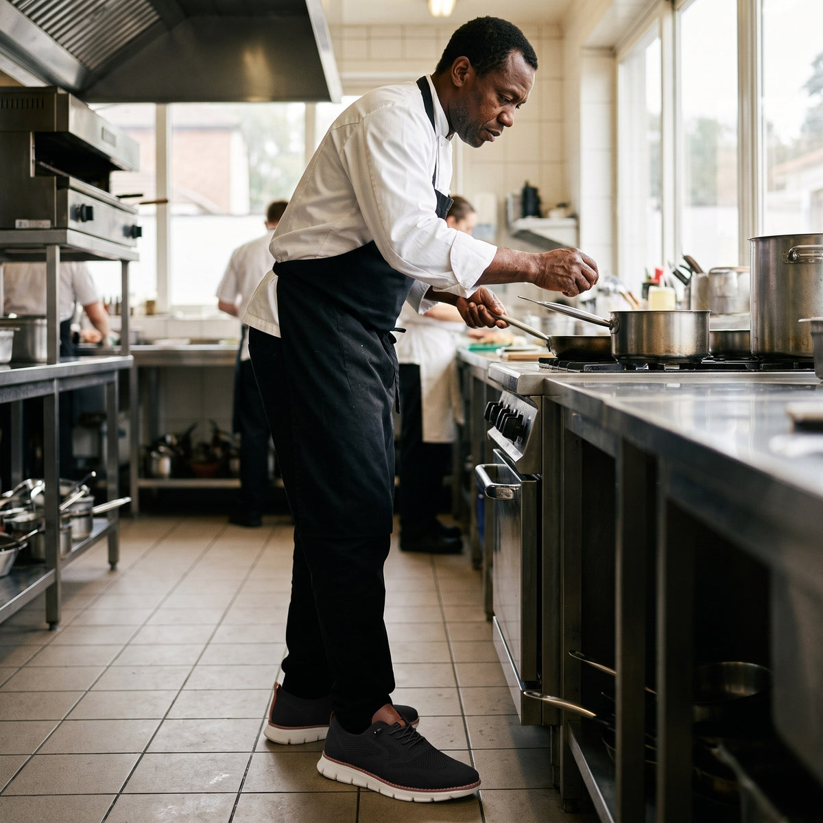 Again Wide in Black, worn by a cook at the stove