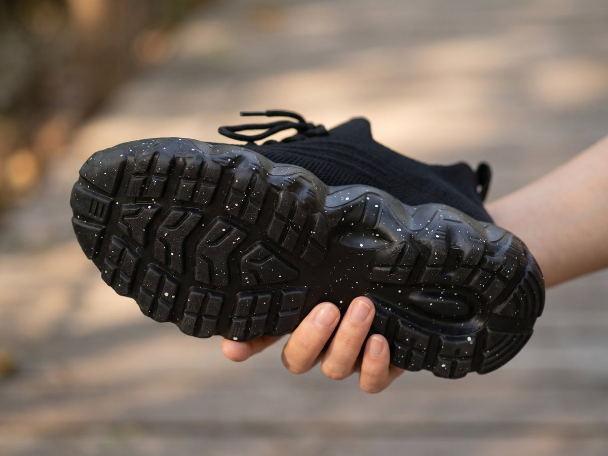 Again Walk: the outsole tread held up to the camera